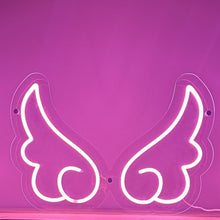 Load image into Gallery viewer, pink-neon-angel-wings-sign-on-a-glowing-pink-background
